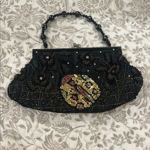 Black and Gold Vintage Clutch with Ornate Medallion